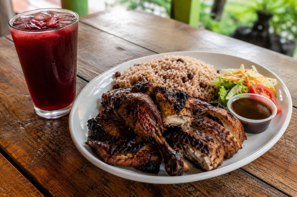 Jamaican jerk chicken with rice and peas